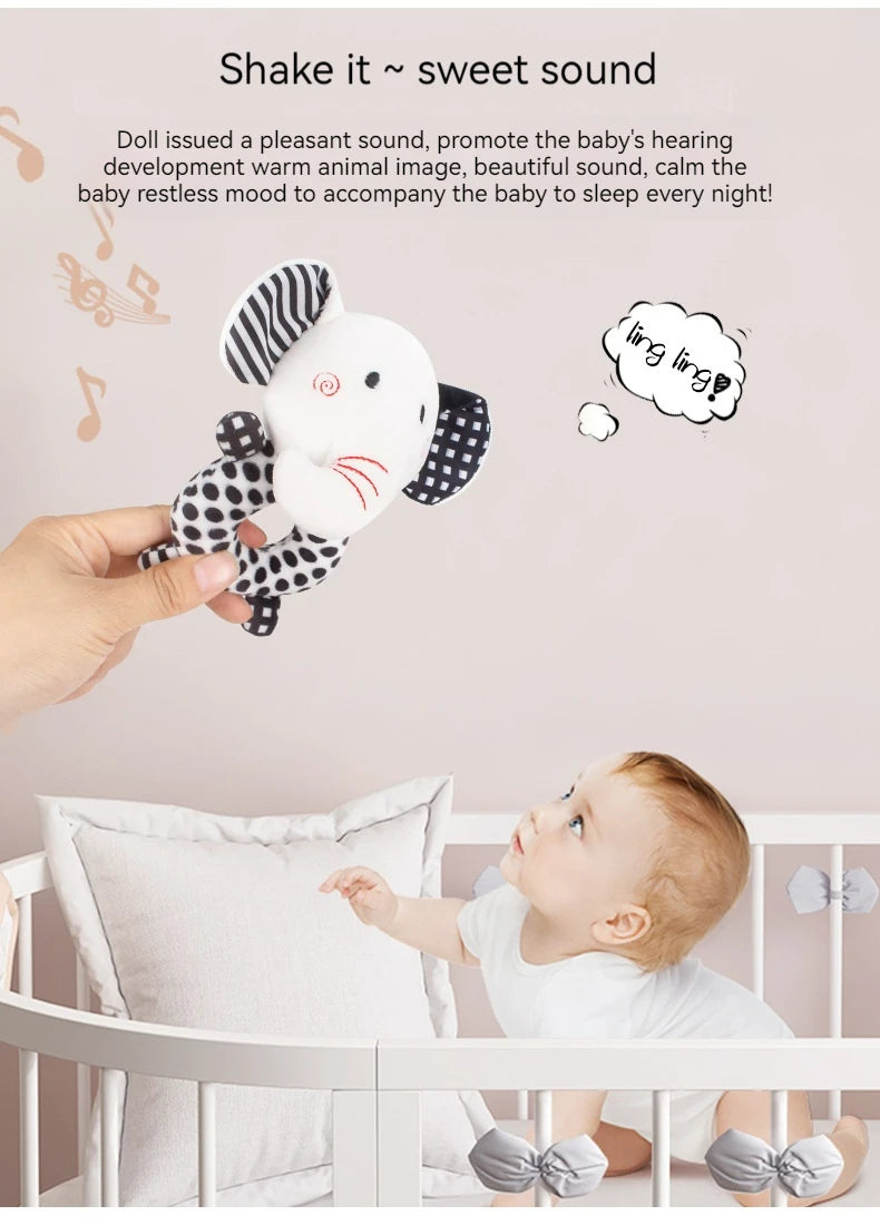 B020 - Black and white baby cloth round hand bell